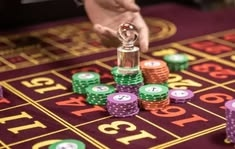 Casushi casino presented on mobile device in Pakistan with slots and live games